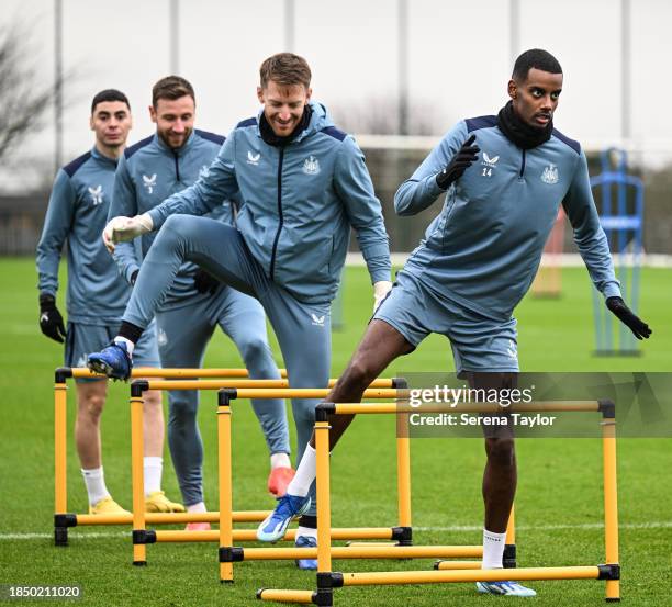 Newcastle United Players seen L-R Miguel Almirón, Paul Dummett Goalkeeper Mark Gillespie and Alexander Isak warm up during the Newcastle United...