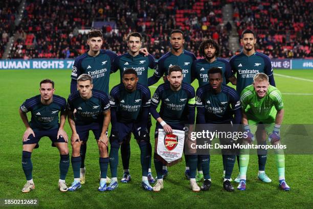 The Arsenal team line up for a photo prior to the UEFA Champions League match between PSV Eindhoven and Arsenal FC at Philips Stadion on December 12,...