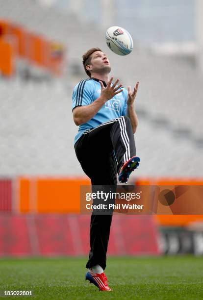 Cory Jane of the All Blacks warms up during a New Zealand All Blacks training session at the Forsyth Barr Stadium on October 17, 2013 in Dunedin, New...