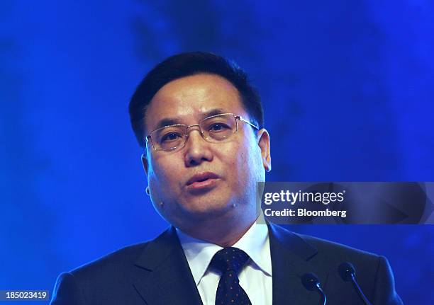 Zhu Fushou, general manager of Dongfeng Motor Corp., speaks at the Global Automotive Forum in Wuhan, China, on Thursday, Oct. 17, 2013. Zhu said the...