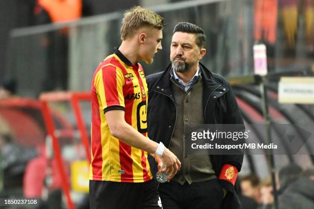 Norman Bassette of Mechelen pictured with Besnik Hasi, head coach of Mechelen, after being substituted during a football game between KV Mechelen and...