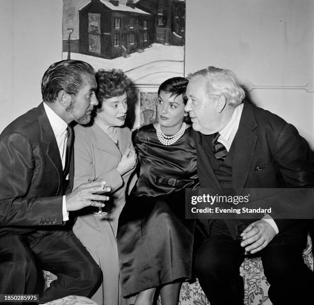 Actors from left, Tyrone Power and Elsa Lanchester , Power's wife Debbie Minardos, and Lanchester's husband, actor and director Charles Laughton ,...