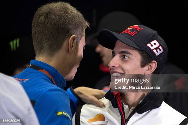 Esteve Rabat of Spain and Pons 40 HP Tuenti speaks with Marc Marquez of Spain and Repsol Honda Team during the press conference ahead of the 2013...