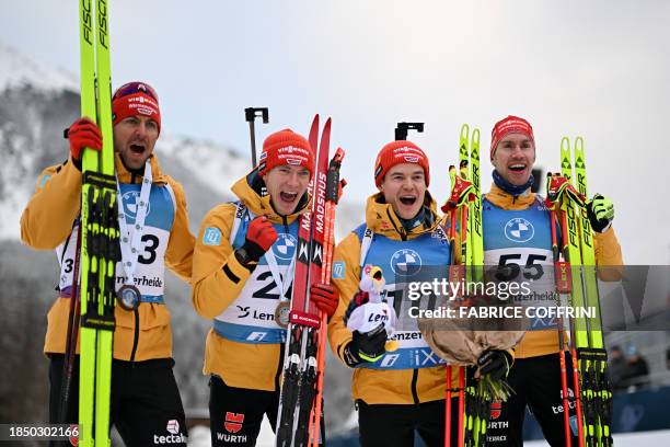 Germany's athletes third-placed Philipp Nawrath, winner Benedikt Doll, fourth-placed Philipp Horn and sixth-placed Johannes Kuehn pose after the men...