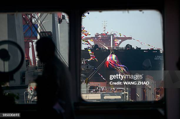 Bulk carrier of Louis Dreyfus Armateurs Group is seen from a wheelhouse during a naming ceremony for bulk carriers at a shipyard in Tianjin on...