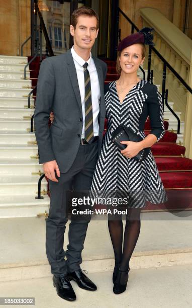 Wimbledon champion Andy Murray and his long time girlfriend Kim Sears arrive at Buckingham Palace on October 17, in London, England. Murray will...