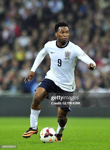 England's striker Daniel Sturridge in action during the World Cup 2014 Group H Qualifying football match between England and Poland at Wembley...