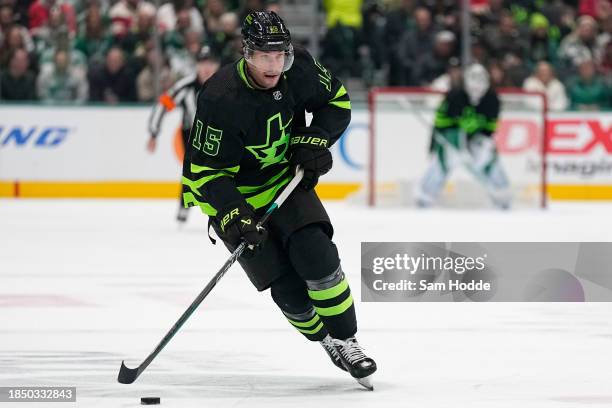 Craig Smith of the Dallas Stars skates with the puck during the third period against the Detroit Red Wings at American Airlines Center on December...