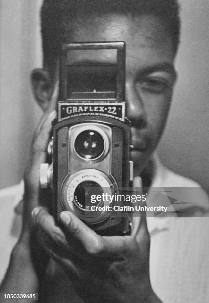 Self portrait of Cecil J. Williams with Graflex 22 Camera. Cecil J. Williams is an American photographer, publisher, author and inventor whose...