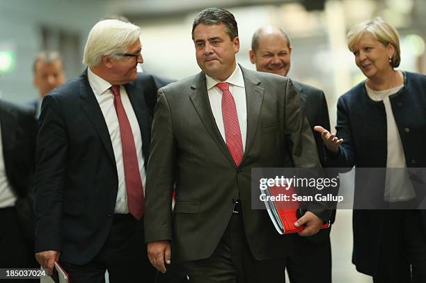 Leading members of the German Social Democrats , including Chairman Sigmar Gabriel , SPD Bundestag faction leader Frank-Walter Steinmeier , and North...