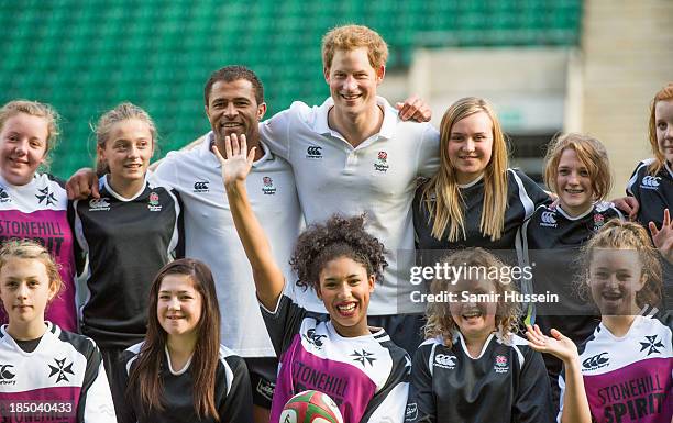 Prince Harry and former England international Jason Robinson pose for a team photo at the RFU All School Programme Coaching Event at Twickenham...