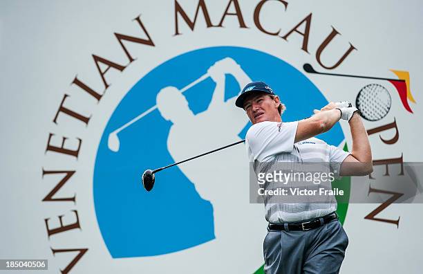 Ernie Els of South Africa tees off on the 11th hole during day one of the Venetian Macau Open at Macau Golf and Country Club on October 17, 2013 in...