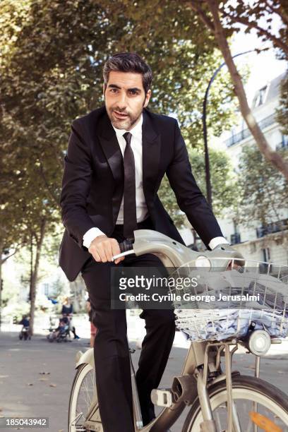 Humorist Ary Abittan is photographed for Self Assignment on September 20, 2013 in Paris, France.