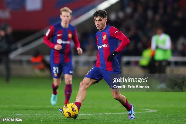 Pedro 'Pedri' Gonzalez of FC Barcelona run with the ball during the LaLiga EA Sports match between FC Barcelona and Atletico Madrid at Estadi Olimpic...