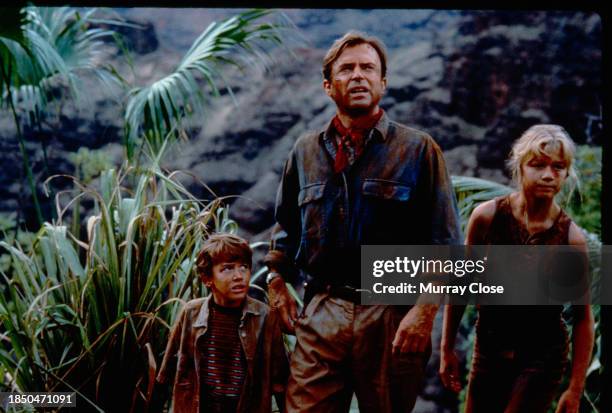 New Zealand actor Sam Neill , with American actors Joseph Mazzello and Ariana Richards , in the film 'Jurassic Park' , 1993.