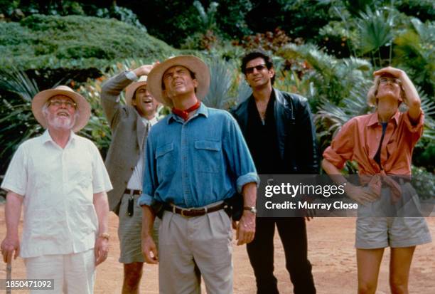 View of, from left, actors Richard Attenborough , Martin Ferrero , Sam Neill , Jeff Goldblum , and Laura Dern in the film 'Jurassic Park' , 1993.
