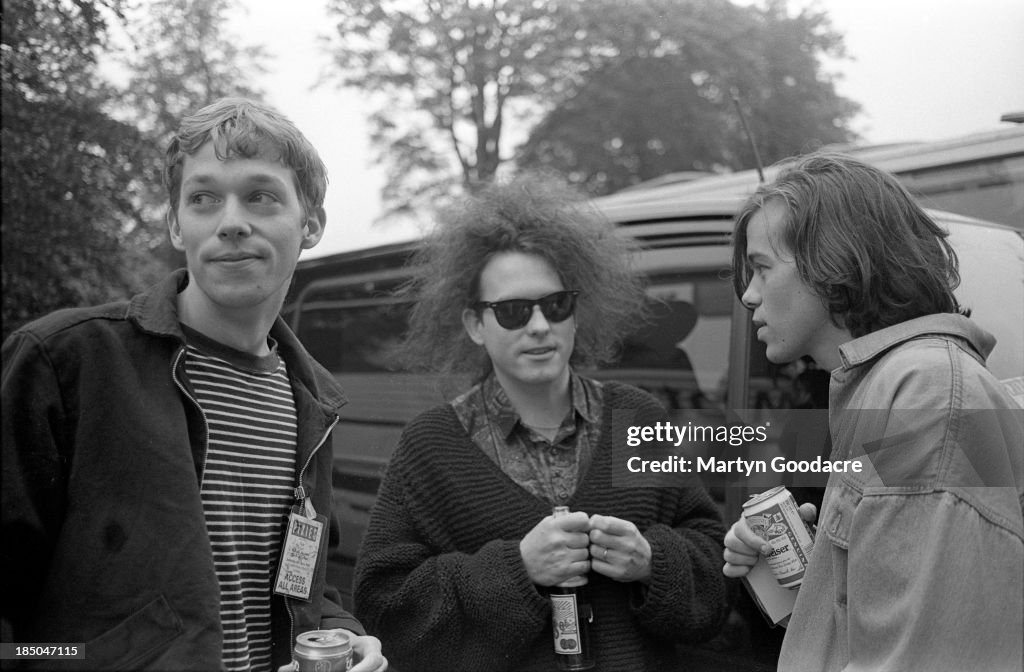 Andy Bell and Mark Gardener of Ride talk to Robert Smith of the Cure...  News Photo - Getty Images