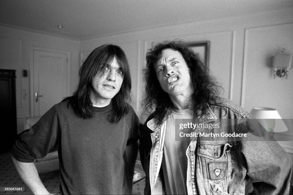Brothers Angus Young and Malcolm Young of AC/DC, portrait in hotel