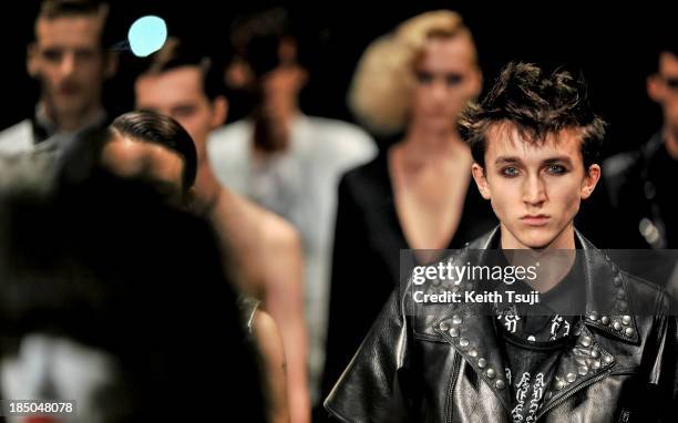 Models showcase designs on the runway during the Christian Dada show as part of Mercedes Benz Fashion Week Tokyo 2014 S/S at Hikarie Hall A of...