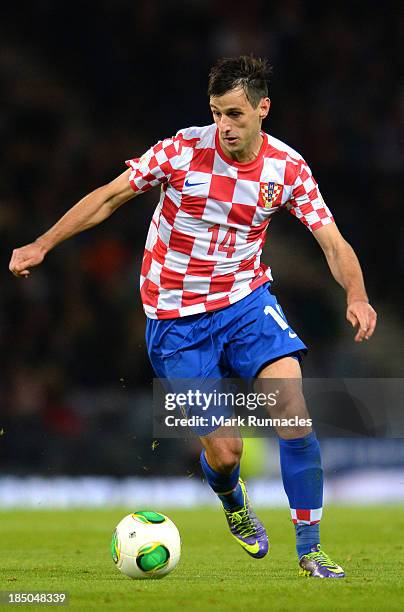 Nikola Kalinic of Croatia in action during the FIFA 2014 World Cup Qualifying Group A match between Scotland and Croatia at Hampden Park on October...