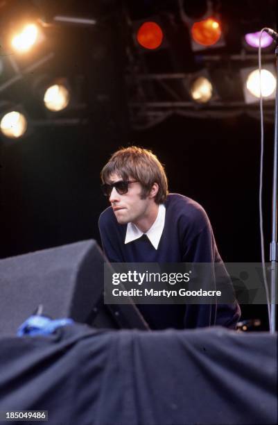 Liam Gallagher of Oasis performs on stage at Glastonbury, United Kingdom, 1994.