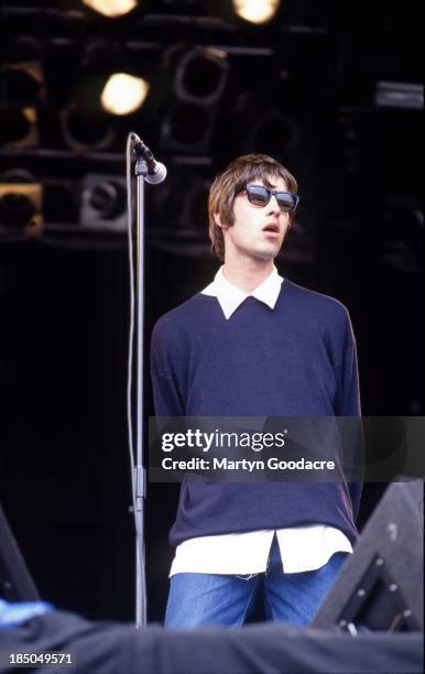Liam Gallagher of Oasis performs on stage at Glastonbury, United Kingdom, 1994.