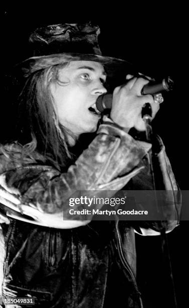 Fields of the Nephilim perform on stage, United Kingdom, 1990.