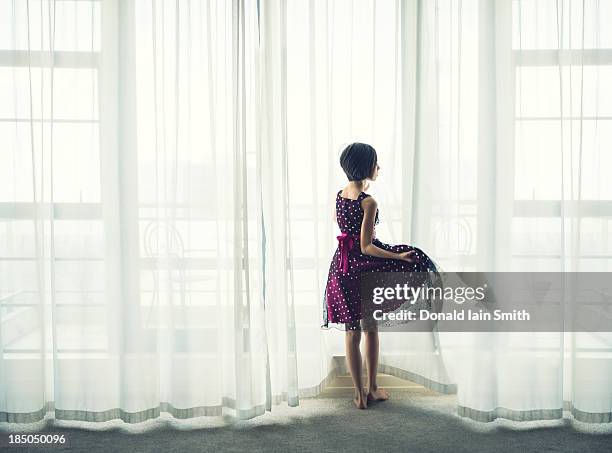 girl at the window - girl white dress stock pictures, royalty-free photos & images