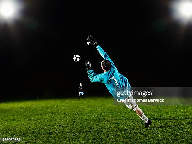 Goalkeeper Rushing Out 170 Male Soccer Players And Goal Keeper Jumping For Ball In Stadium ...