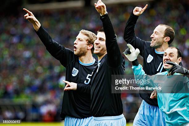 soccer team celebrating together in stadium - washington football team fotografías e imágenes de stock