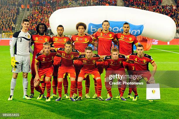 The Belgian team pose before the FIFA 2014 World Cup Group A qualifying match between Belgium and Wales at the King Baudouin stadium on October 15,...