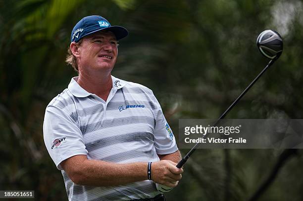 Ernie Els of South Africa tees off on the 2nd hole during day one of the Venetian Macau Open at Macau Golf and Country Club on October 17, 2013 in...
