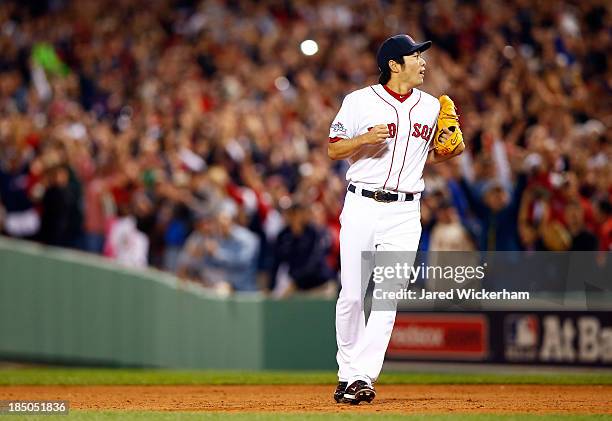 Koji Uehara of the Boston Red Sox reacts after defeating the Tampa Bay Rays 7-4 in Game Two of the American League Division Series at Fenway Park on...