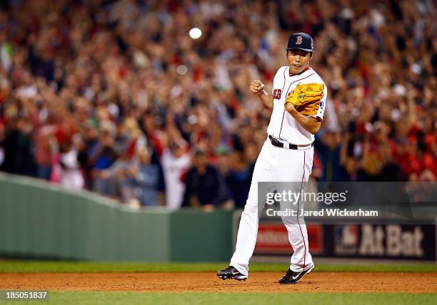 Koji Uehara of the Boston Red Sox reacts after defeating the Tampa Bay Rays 7-4 in Game Two of the American League Division Series at Fenway Park on...