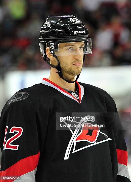 Brett Sutter of the Carolina Hurricanes against the Phoenix Coyotes during play at PNC Arena on October 13, 2013 in Raleigh, North Carolina. The...