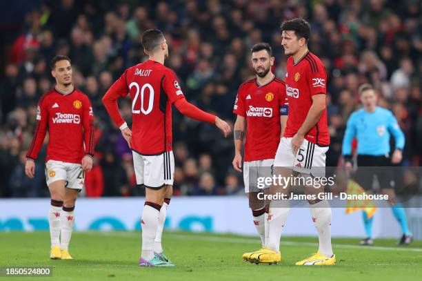 Harry Maguire of Manchester United is injured and is substituted during the UEFA Champions League match between Manchester United and FC Bayern...