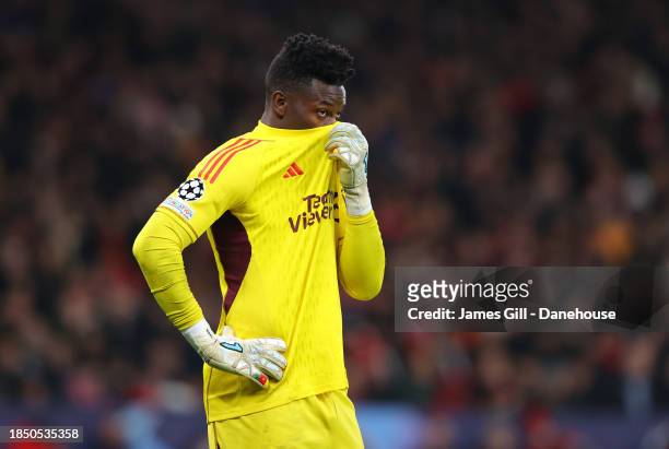Andre Onana of Manchester United looks dejected during the UEFA Champions League match between Manchester United and FC Bayern München at Old...
