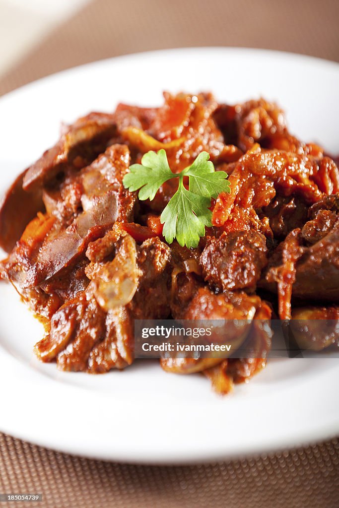 Chicken livers with tomato sauce