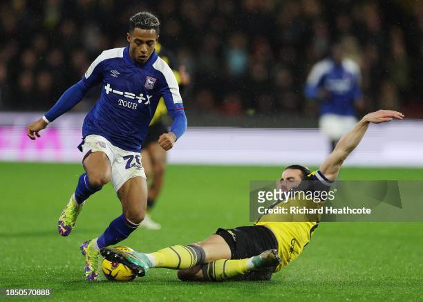 Omari Hutchinson of Ipswich Town is challenged by Wesley Hoedt of Watford during the Sky Bet Championship match between Watford and Ipswich Town at...