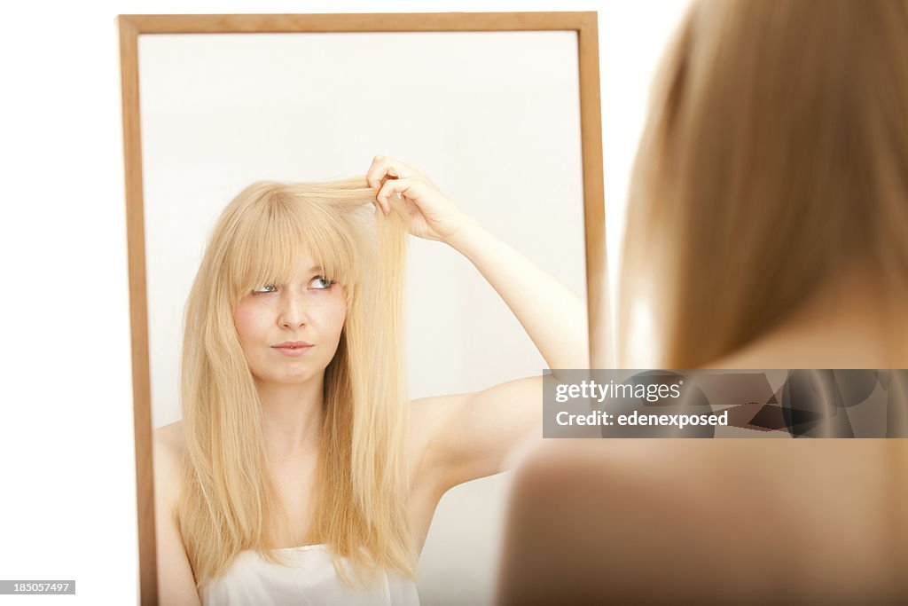 Female Looking At Hair