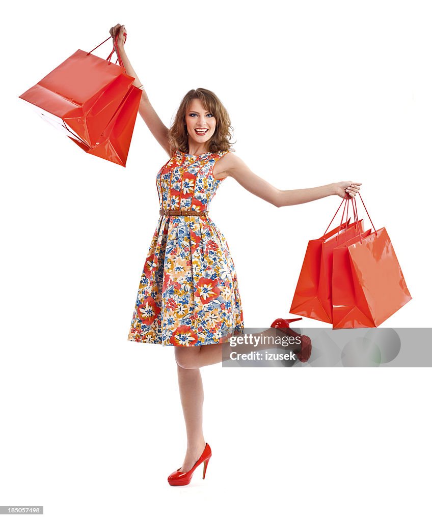 Excited shopping woman