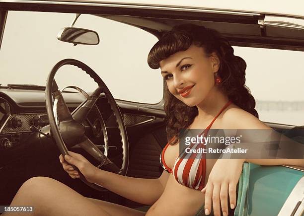 on the road again. - vintage pin up girl stock pictures, royalty-free photos & images