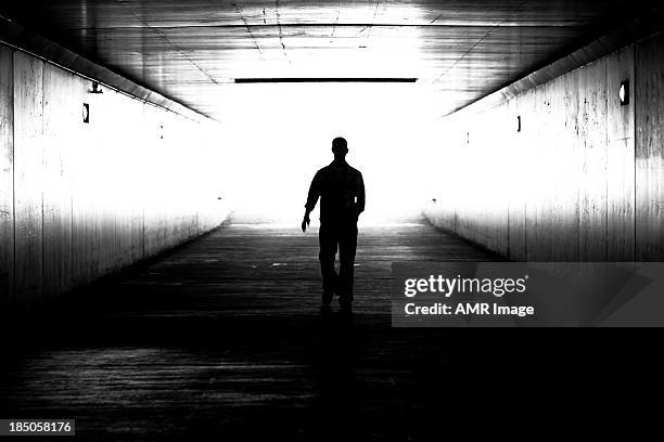 tunnel suilhuette - light at the end of the tunnel hope stock pictures, royalty-free photos & images