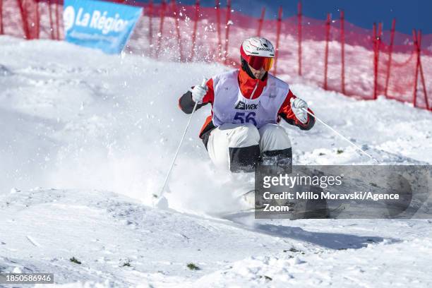 Elliot Vaillancourt in action, takes 2nd place during the FIS Freestyle Ski World Cup Men's and Women's Moguls on December 15, 2023 in Alpe d'Huez,...