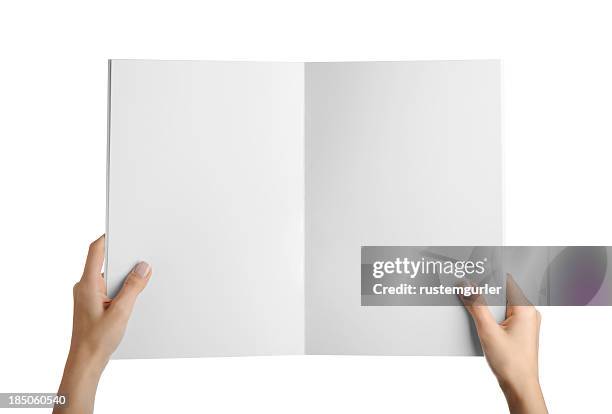 hands holding blank magazine page - hands holding book stock pictures, royalty-free photos & images