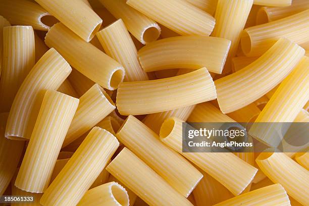 rigatoni pasta - rigatoni stock-fotos und bilder