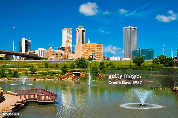 tulsa skyline, pond, and fountains - tulsa v oklahoma stock pictures, royalty-free photos & images