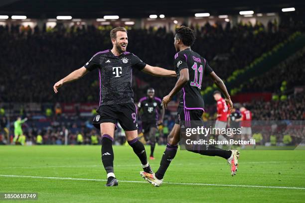 Kingsley Coman of Bayern Munich celebrates with Harry Kane of Bayern Munich after scoring their team's first goal during the UEFA Champions League...