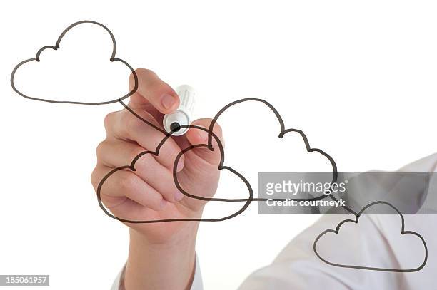 woman drawing a cloud computing icon - interactive whiteboard icon stock pictures, royalty-free photos & images