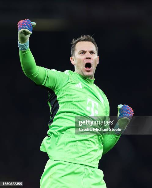 Manuel Neuer of Bayern Munich celebrates as Kingsley Coman of Bayern Munich scores their team's first goal during the UEFA Champions League match...